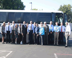 Grand Jurors in from of a bus